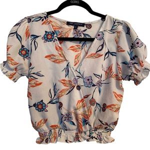 One ❤️Clothing Floral blouse. Size small. With ruffles.